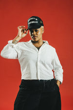 PROPERTY OF FOURWALLS TRUCKER CAP - BLACK